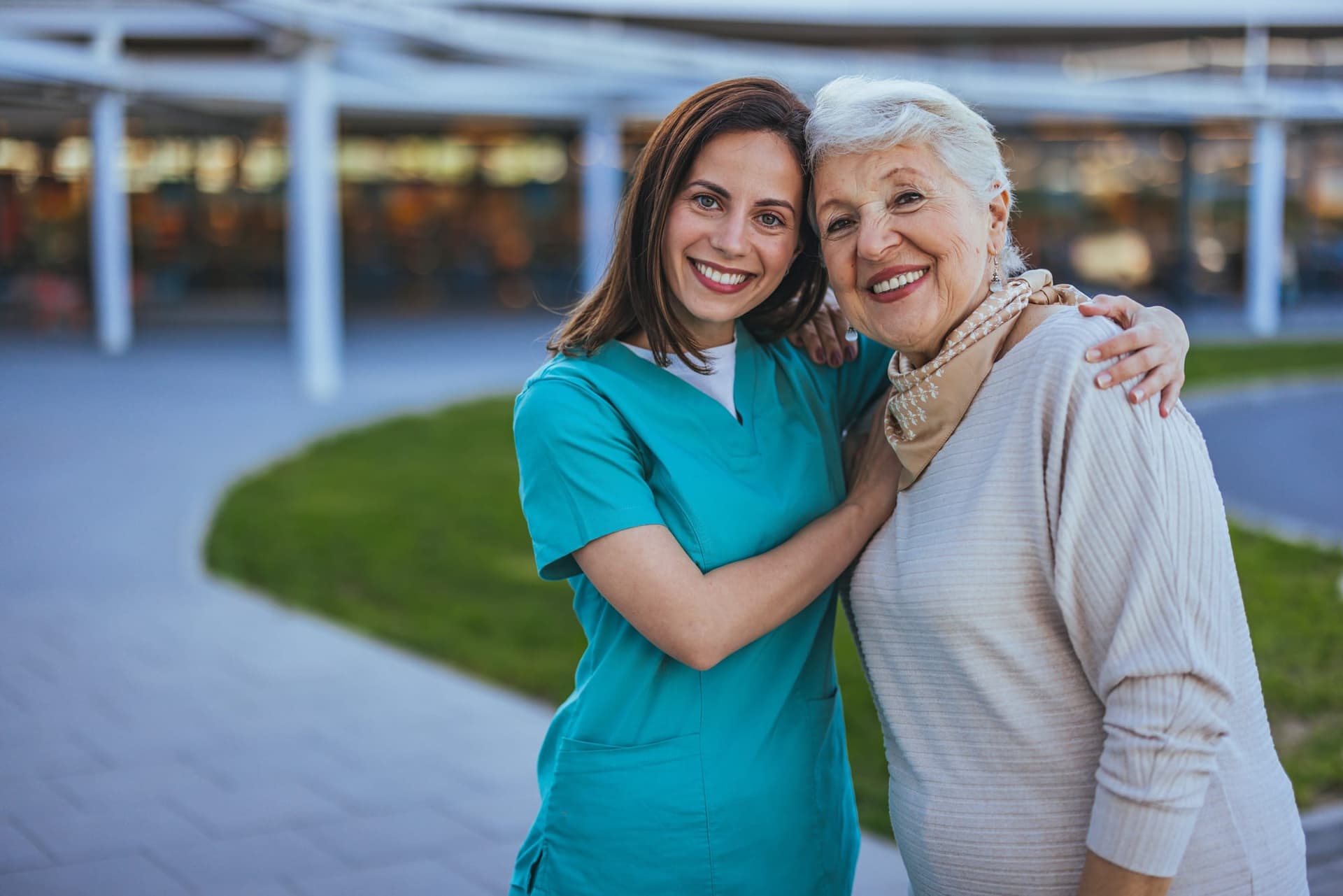 Aged care nurse supporting an elderly resident in an Australian residential care home